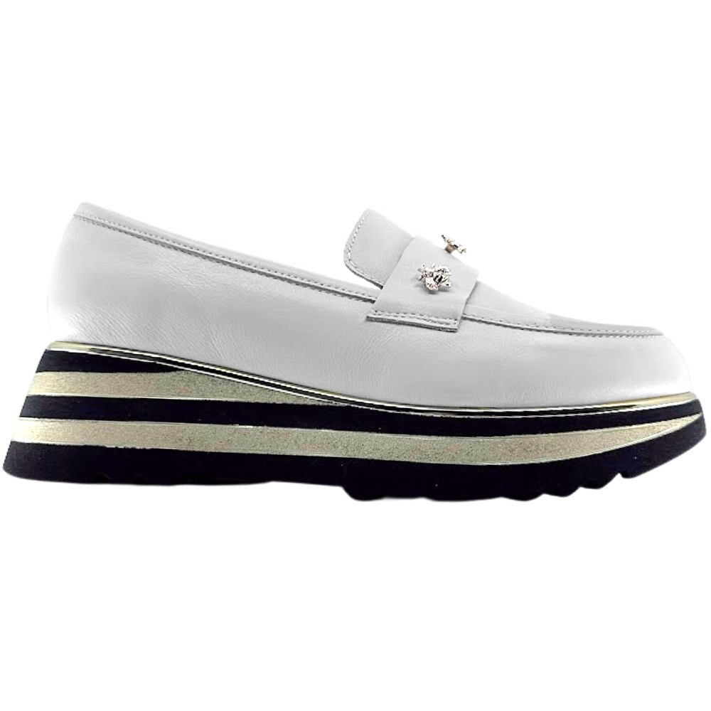 Cream loafer shoe with gold bees and a striped platform sole on a white background
