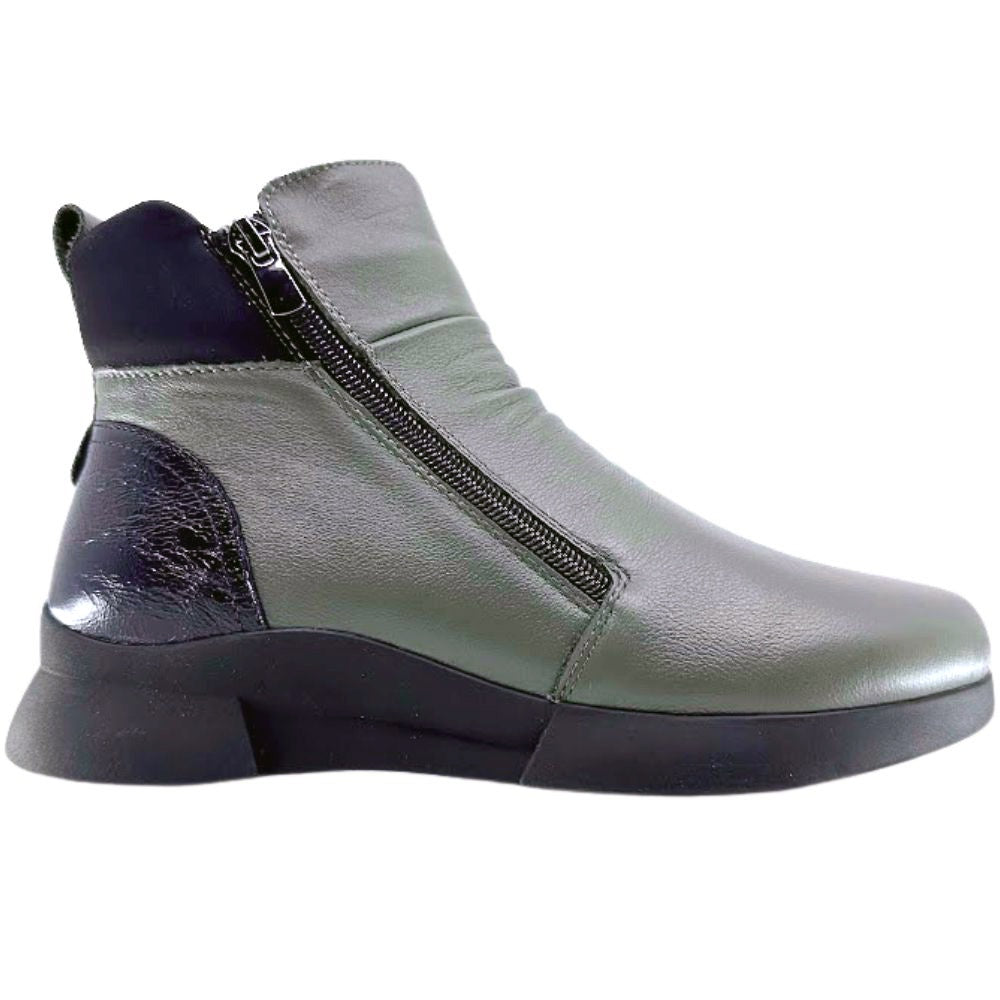 Khaki ankle boot with black accents on a white background