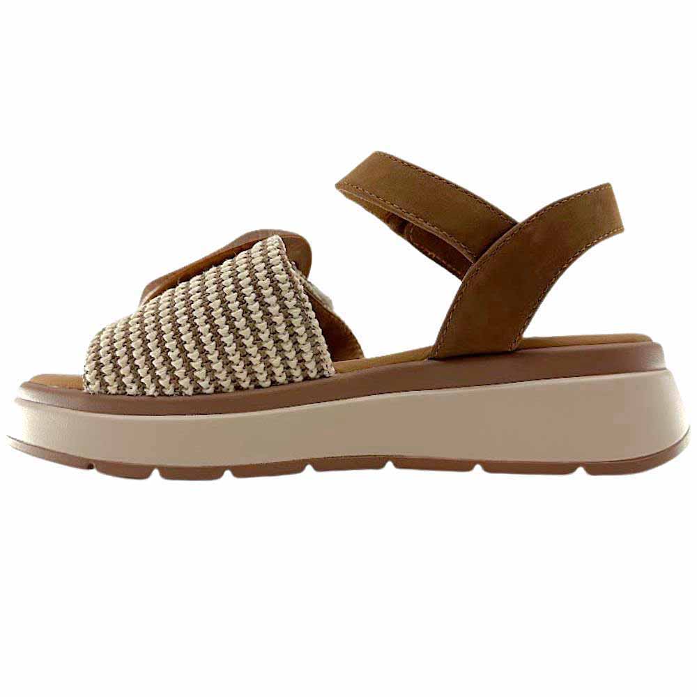 A sandal with a tan and cream woven strap across the vamp and a tan ankle strap, against a white background.