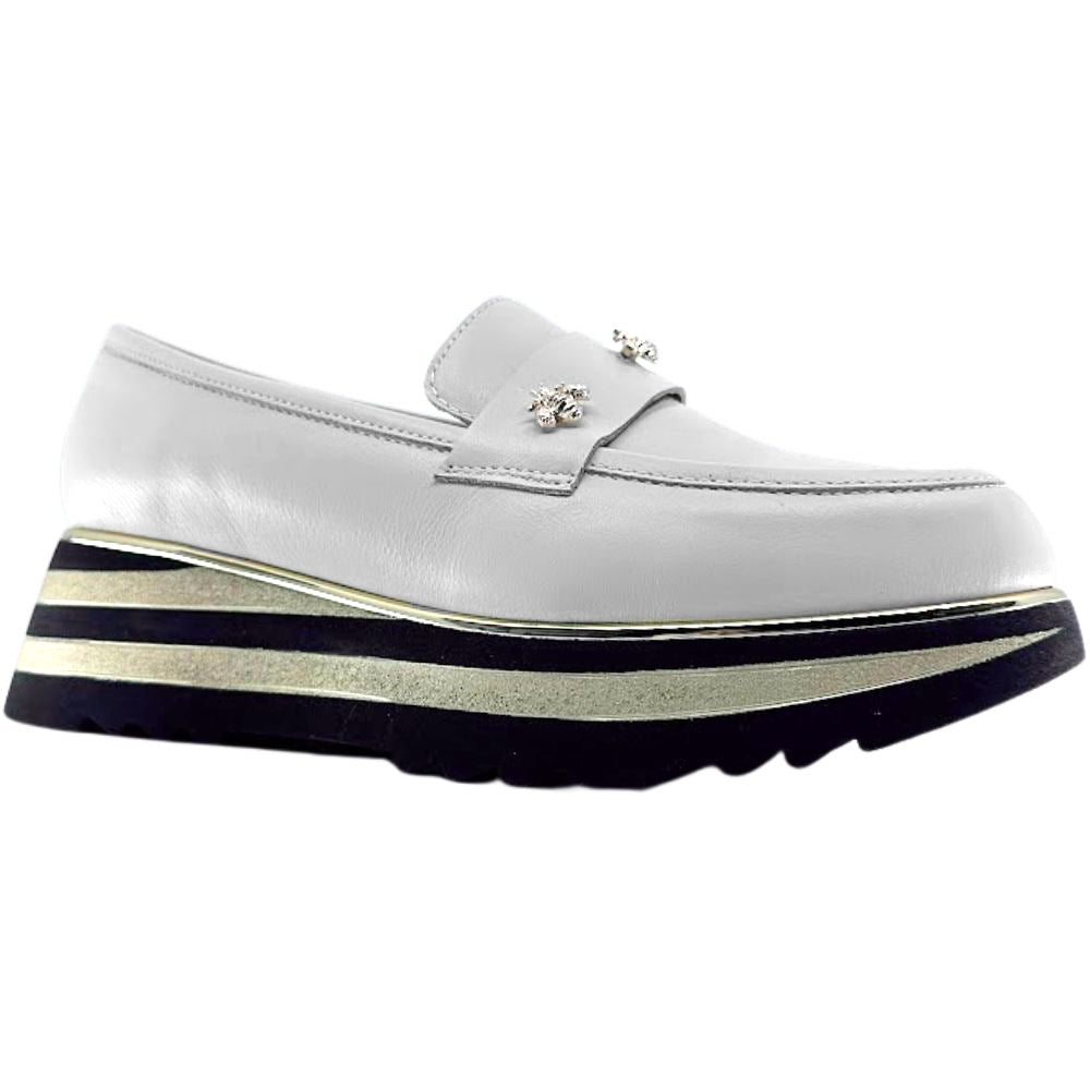 Cream loafer shoe with gold bees and a striped black sole on a white background