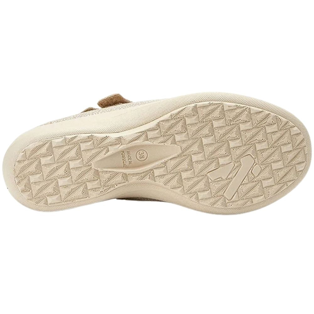 The beige outsole of a shoe, showing a textured geometric tread pattern with the text 'Made In Portugal', photographed against a solid white background.
