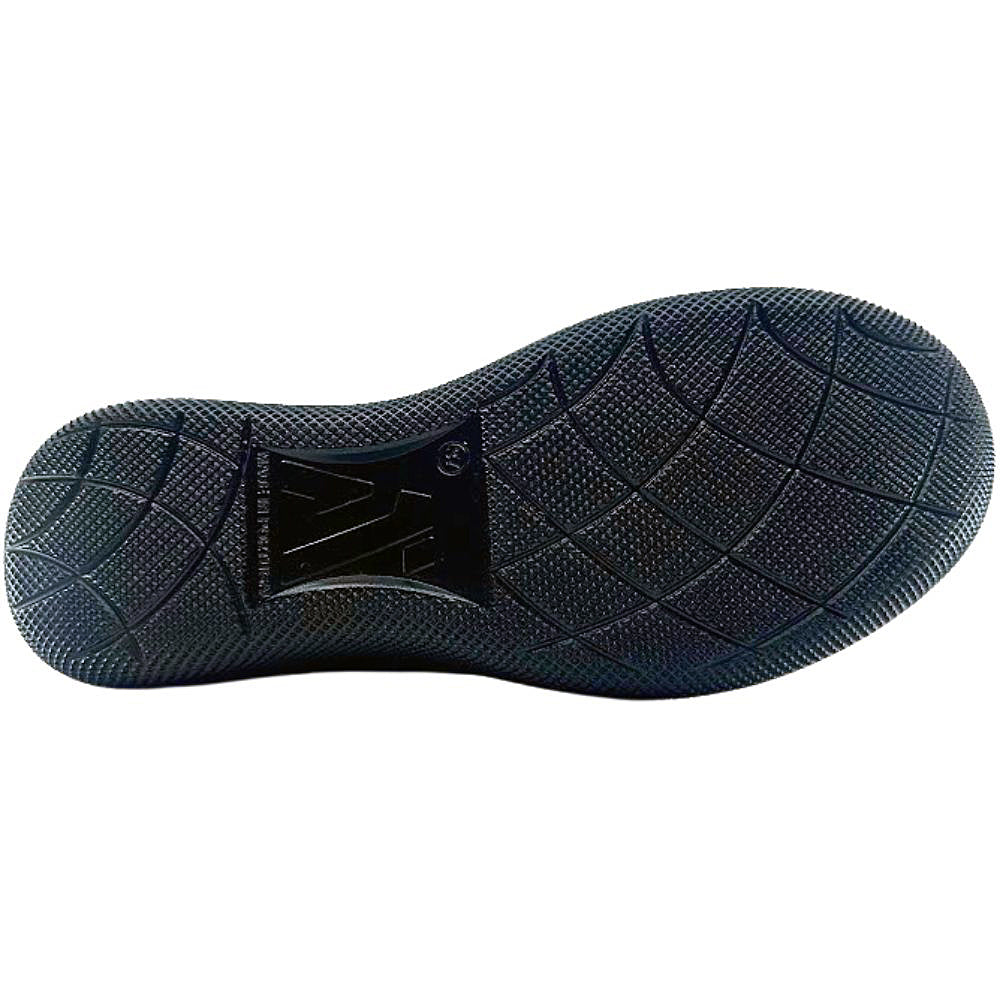 Black shoe sole with tread pattern on a white background