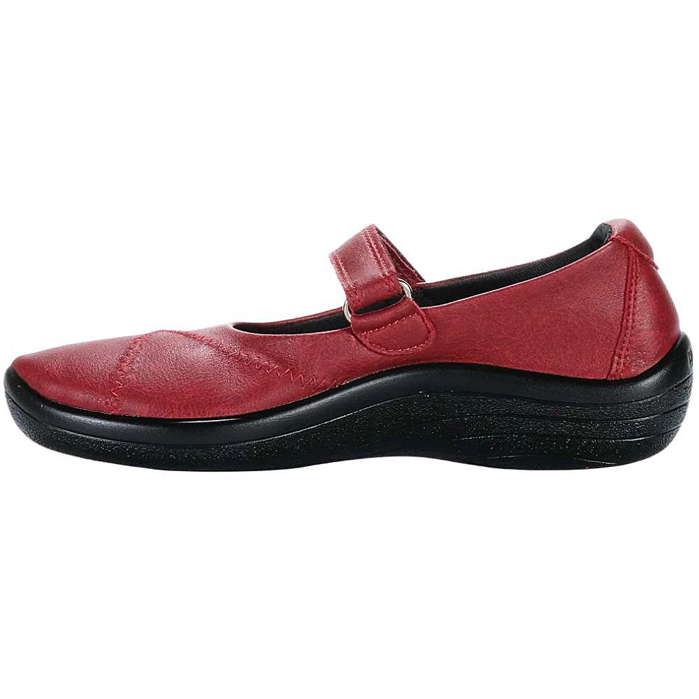 Red Mary-Jane shoe with a black sole on a white background