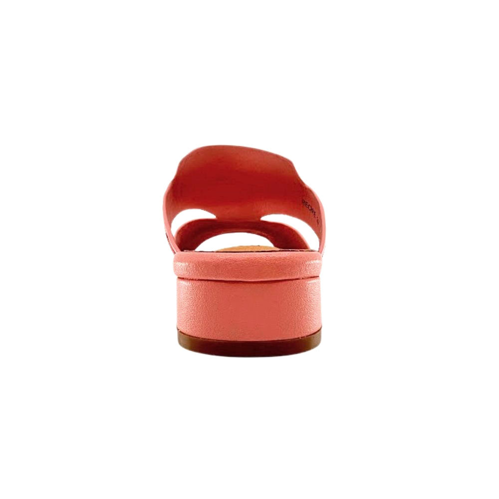 The back of a pink mule sandal with a low block heel, shown on a white background.