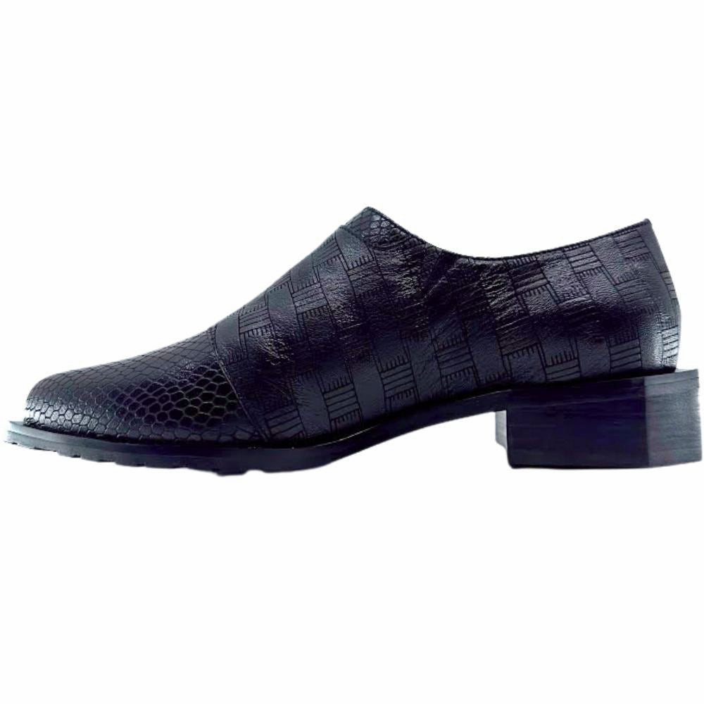 Black textured shoe on a white background