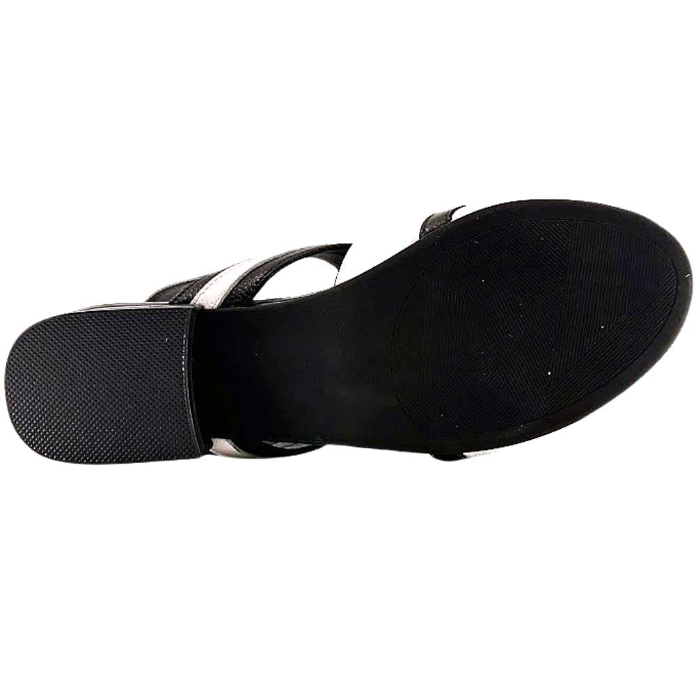 A black rubber sandal sole with good tread, against a white background