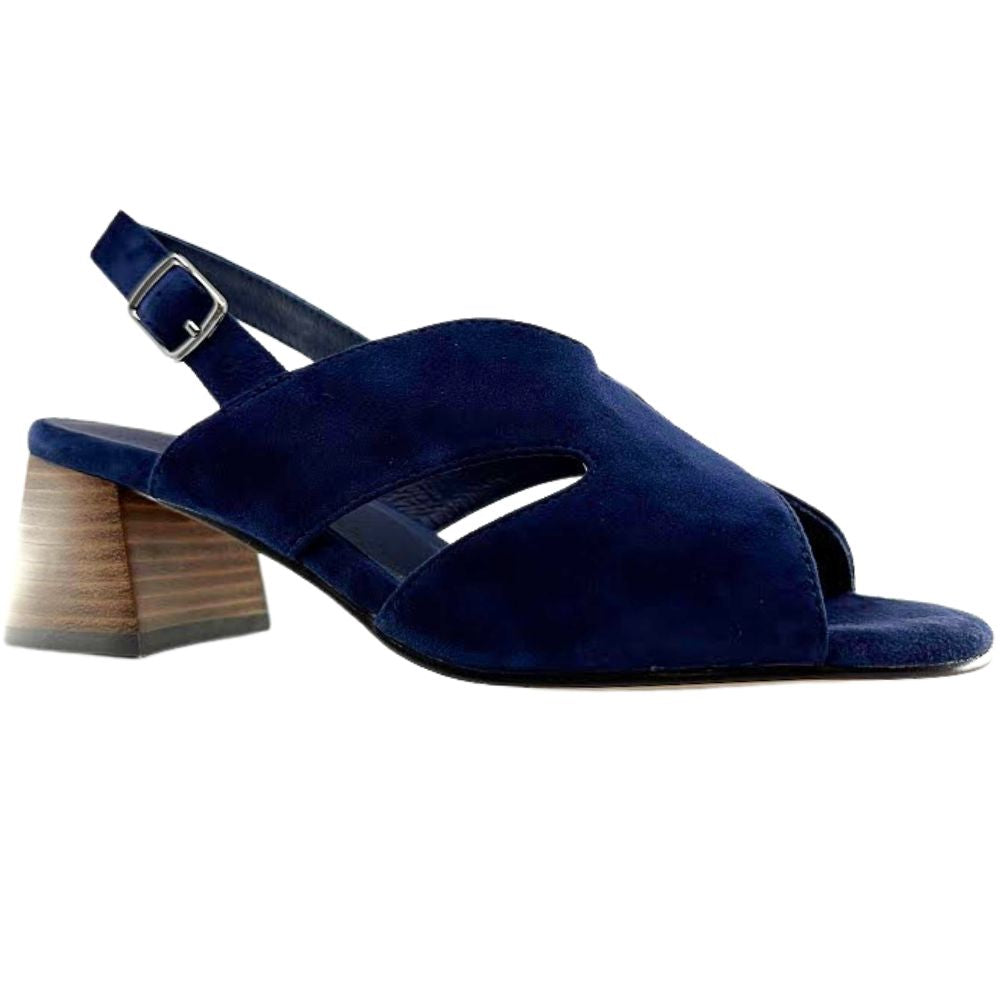 A navy blue suede slingback sandal with a chunky wooden block heel and cutout details on the toe and instep, shown against a plain white background.