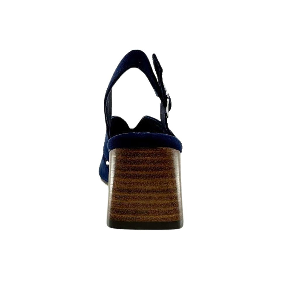 A single women's slingback sandal shown from the back, featuring a navy suede upper and a chunky block heel with a brown wood-grain pattern, set against a plain white background.