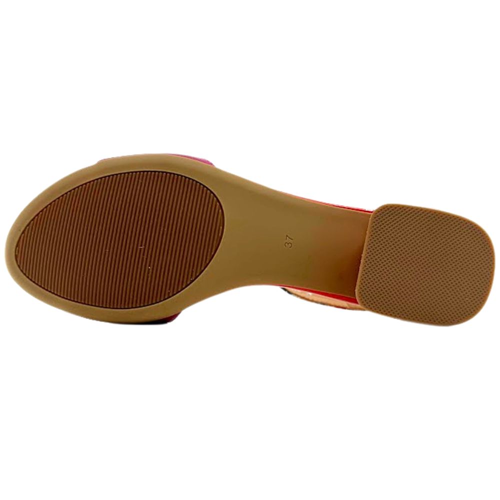 Brown sole of a low-heeled sandal on a white background