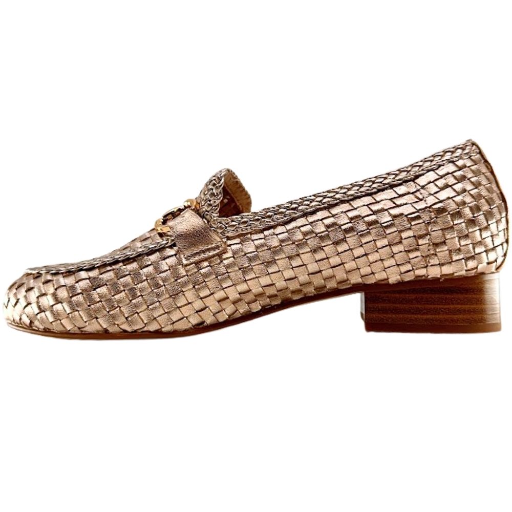 A single woven leather loafer in a metallic rose gold finish with a low brown block heel, shown in profile against a plain white background.