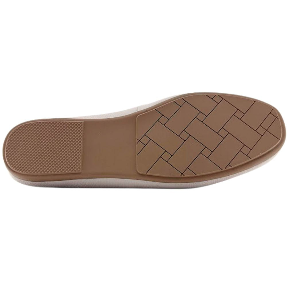 Brown shoe sole with a textured pattern on a white background