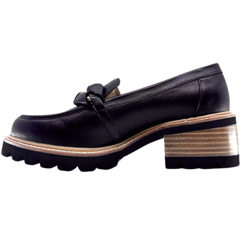 Black loafer shoe on a white background