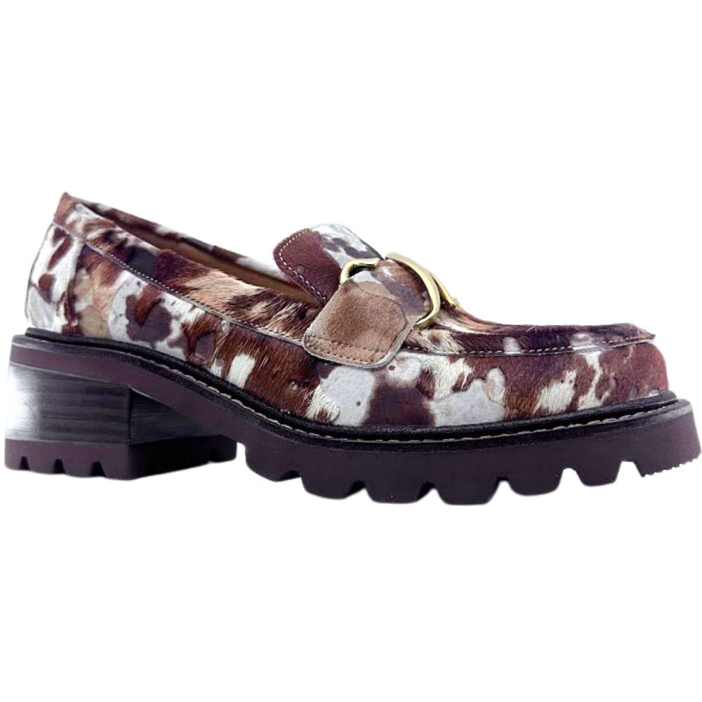 Animal print brown and white loafer shoe with a gold buckle on a white background