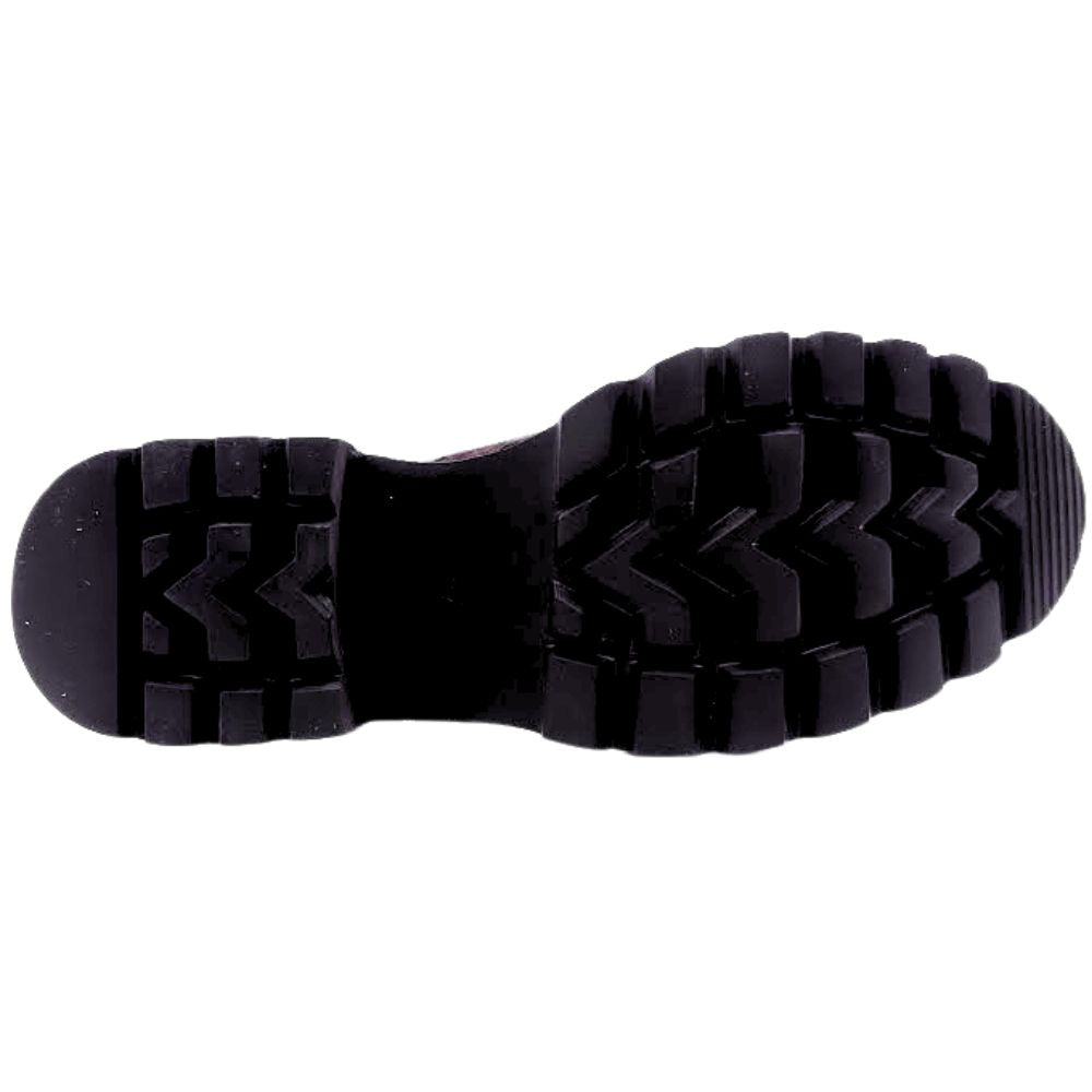 Close-up of a black shoe sole on a white background