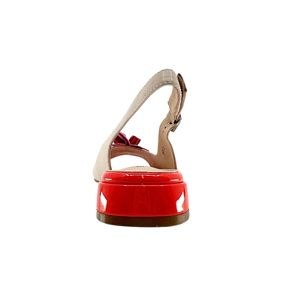 A single women's slingback sandal shown from the back, featuring a glossy red patent leather heel and a beige leather slingback strap.