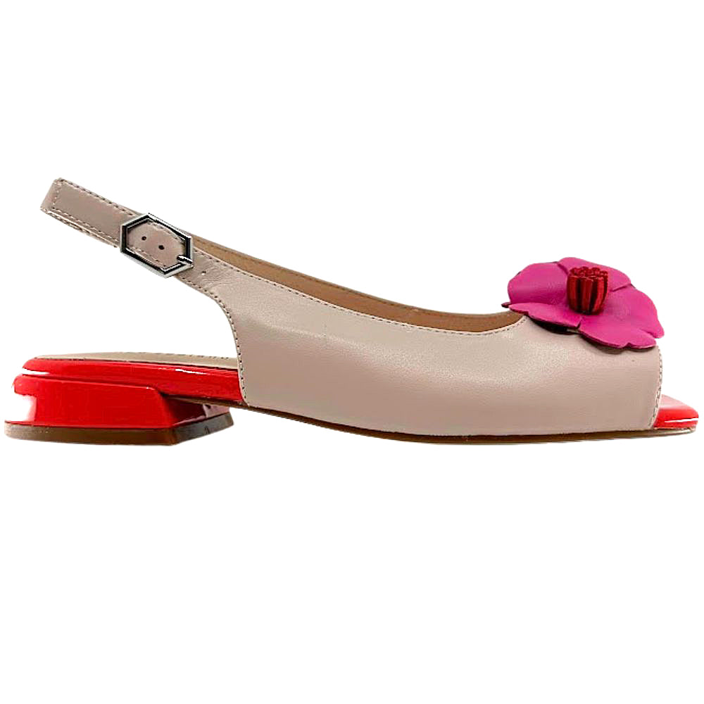 A single women's slingback flat sandal in light beige leather with a bright pink flower embellishment on the toe and a glossy red block heel, shown against a plain white background.