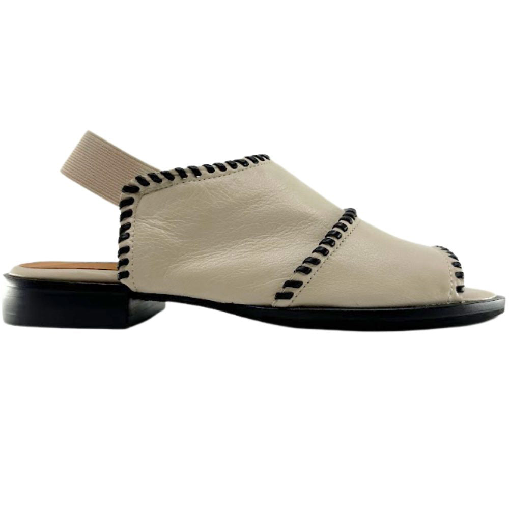 A single cream leather slingback sandal with black braided trim along the strap and edge, set against a plain white background.