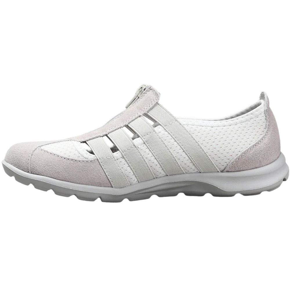 Cream casual shoe with taupe accents on a white background