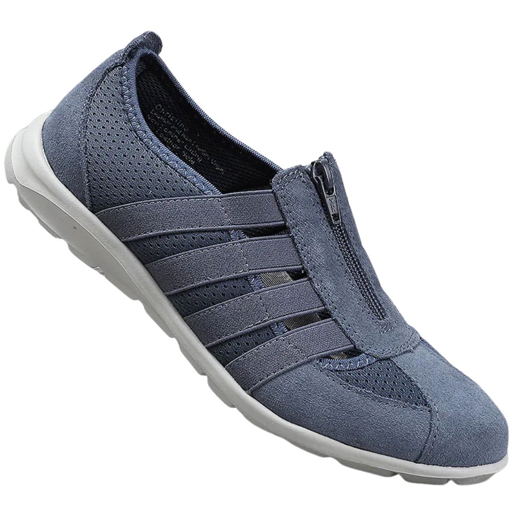 Blue slip-on shoe with a grey sole on a white background