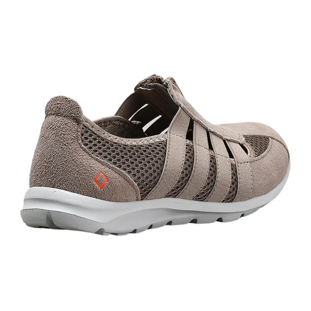 Taupe casual shoe with grey sole on a white background