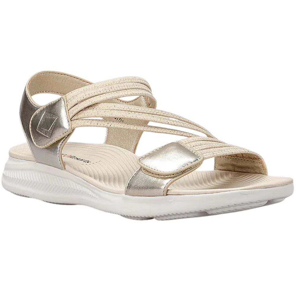 A metallic champagne gold women's sandal with multiple elastic woven straps and a thick white cushioned sole, shown in a side profile on a white background.