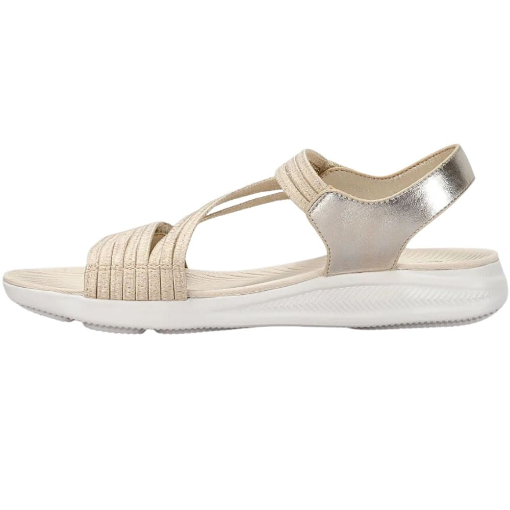 A metallic champagne gold women's sandal with multiple elastic woven straps and a thick white cushioned sole, shown in a side profile on a white background.