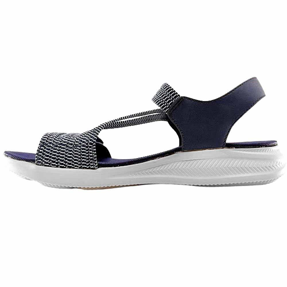 A single navy blue sandal with elasticated navy and white straps on a white sole, on a white background.
