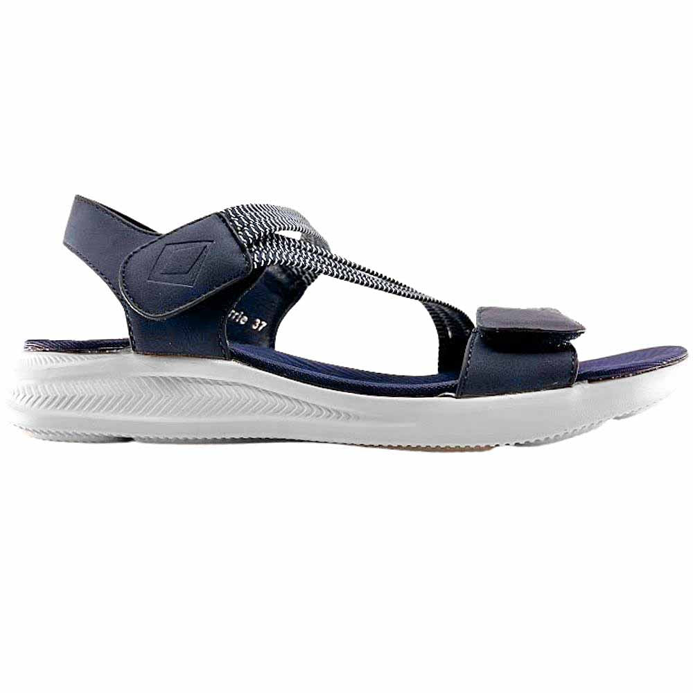 A single navy blue sandal with elasticated navy and white straps on a white sole, on a white background.