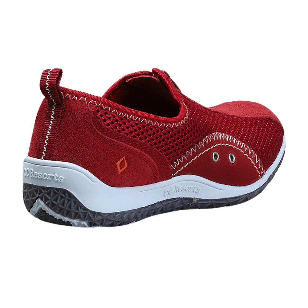 Red slip-on shoe with white sole on a white background