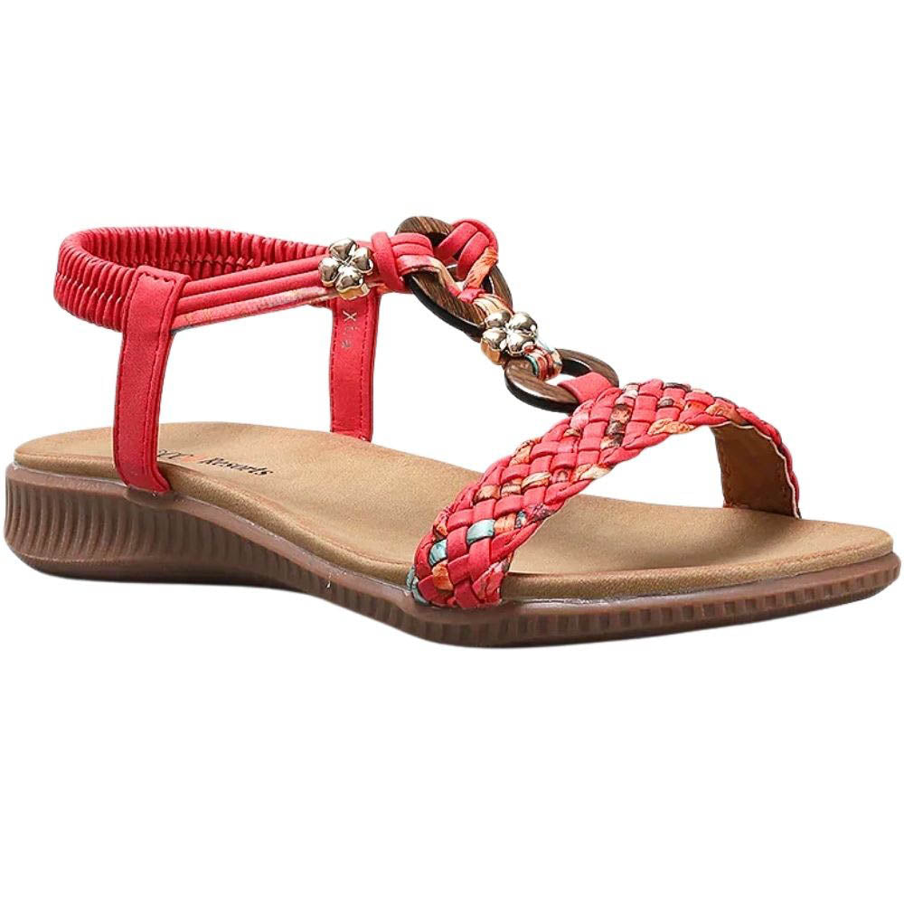 A red woven sandal with a brown wedge sole, featuring a braided T-strap, a braided ankle strap with decorative wooden rings, and a braided front strap with small bead accents.