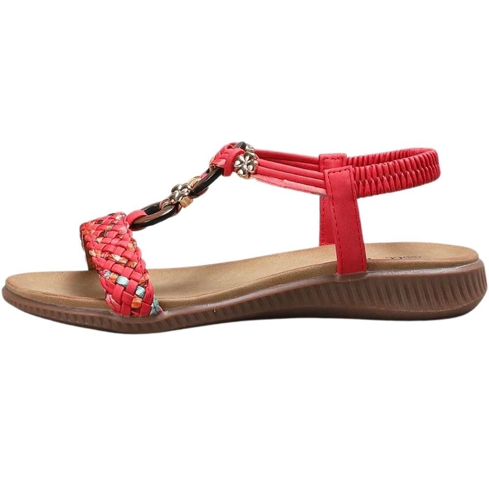 A red flat sandal with a braided T-strap and a brown wedge sole, shown from a side profile on a white background.