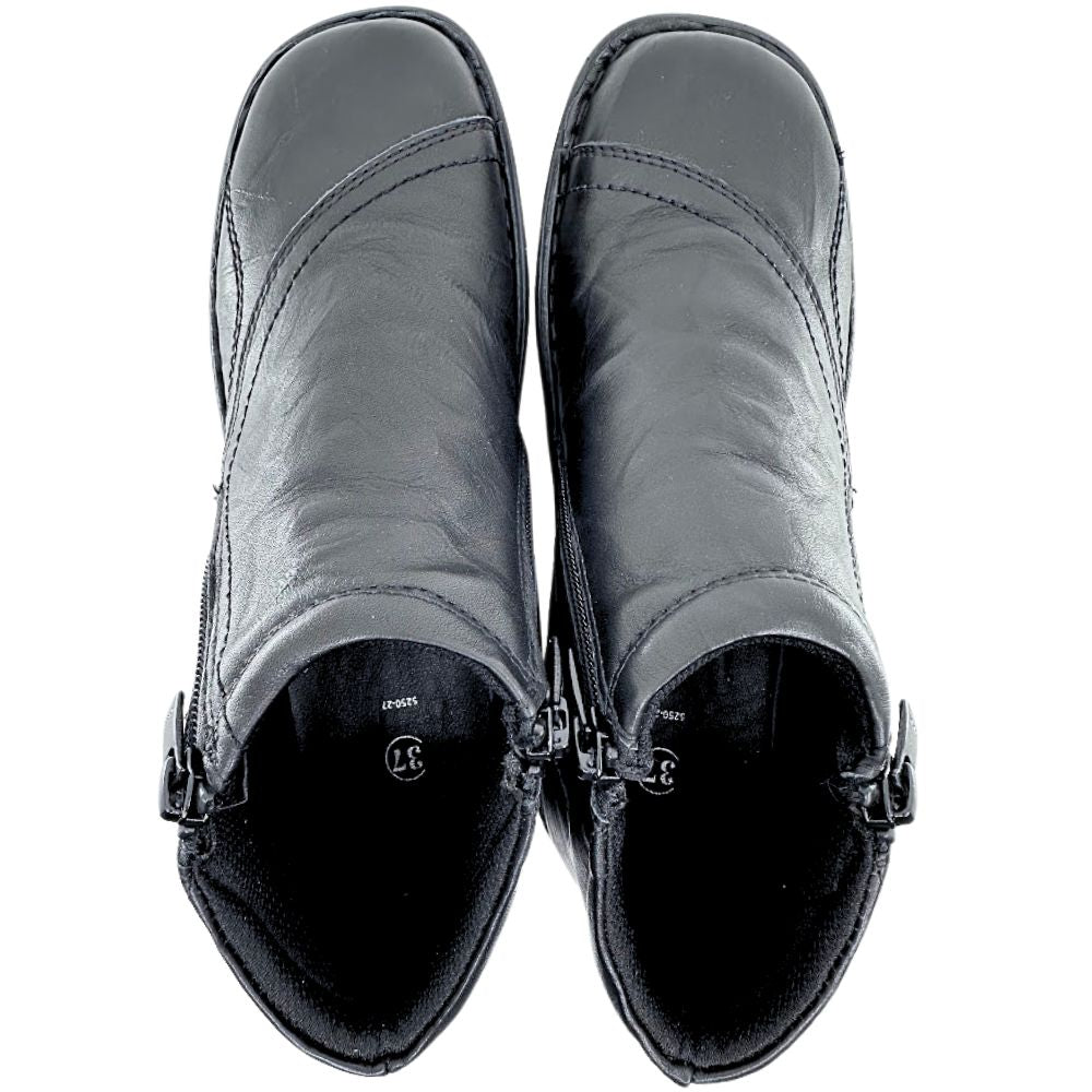 Pair of black ankle boots on a white background