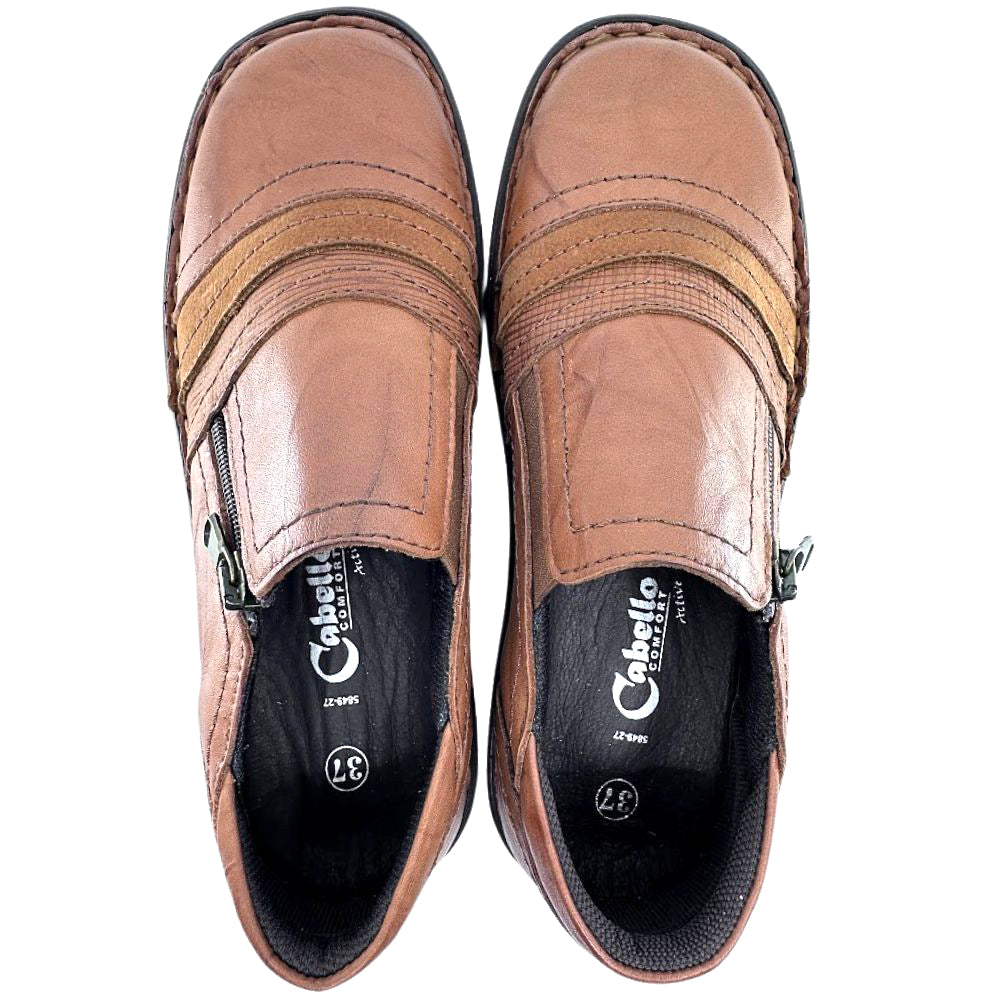 Pair of brown slip-on shoes with 'Cabello' branding on a white background