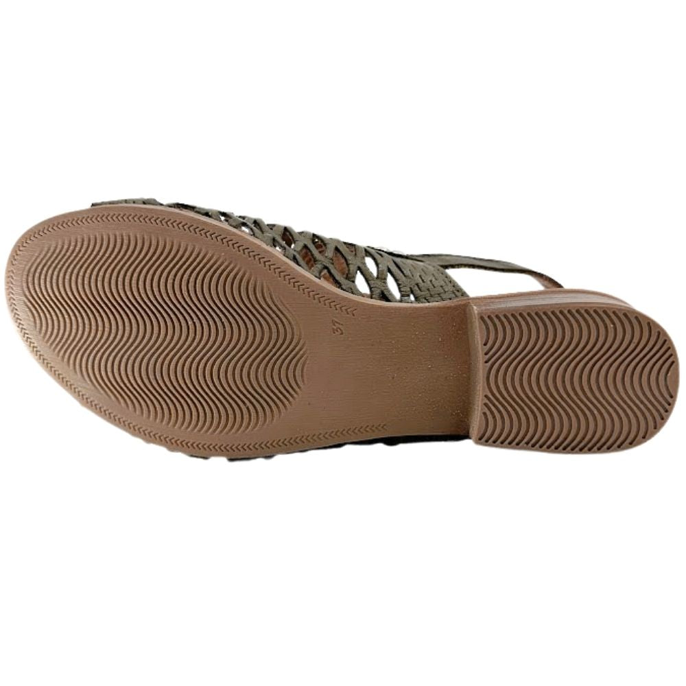 The brown rubber outsole of a Cabello sandal, showing a wavy tread pattern, against a white background.