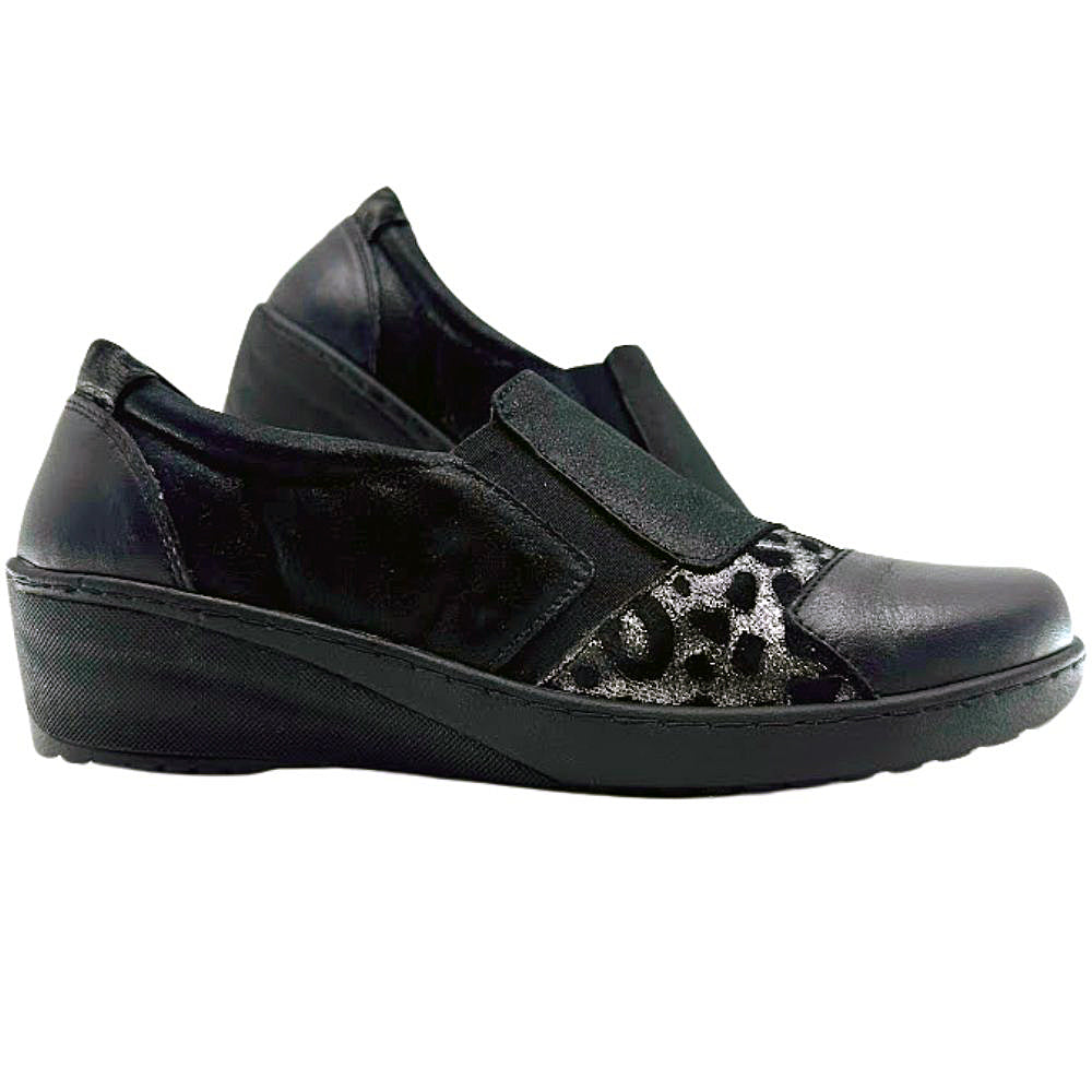 Black wedge shoes with leopard print insole on a white background