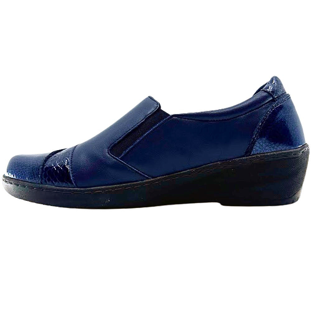 Navy shoe with a black sole on a white background