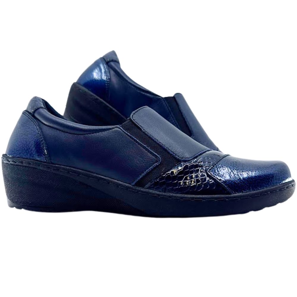 Pair of navy slip-on shoes with patent leather accents on a white background