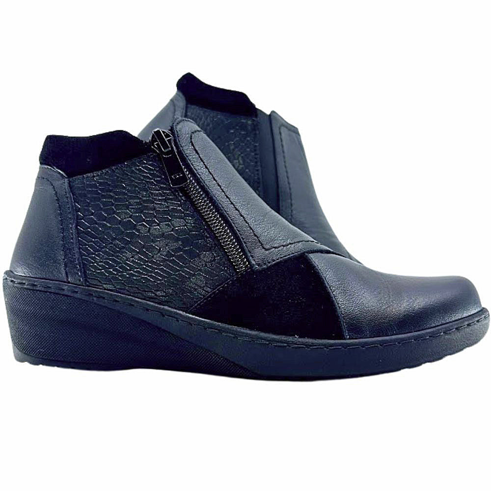 Pair of black leather wedge ankle boots on a white background