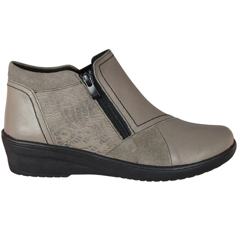 Taupe leather ankle boot with a black zipper on a white background