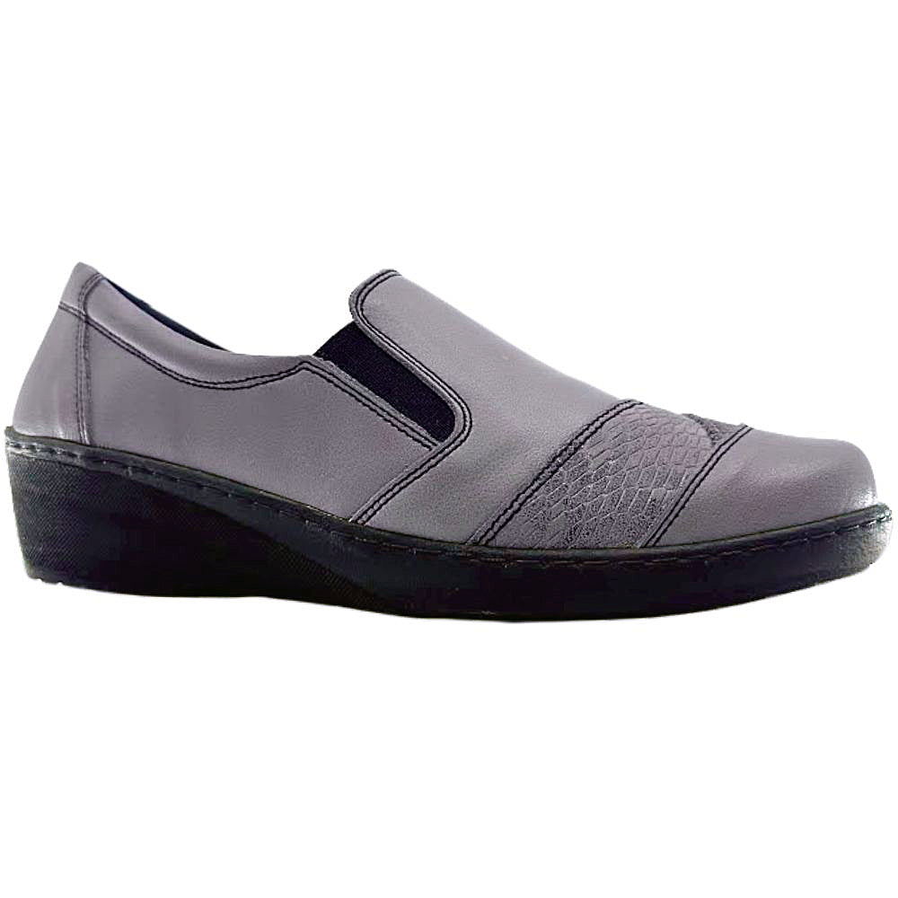 Taupe slip-on shoe with a black sole on a white background
