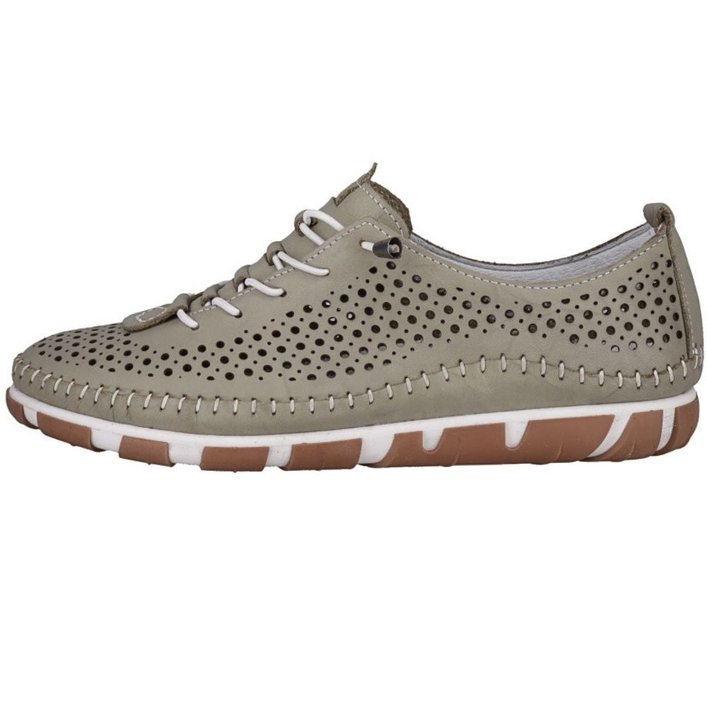 An inside view of an olive green perforated Turkish leather sneaker with bungee laces and stitched detailing, against a white background.