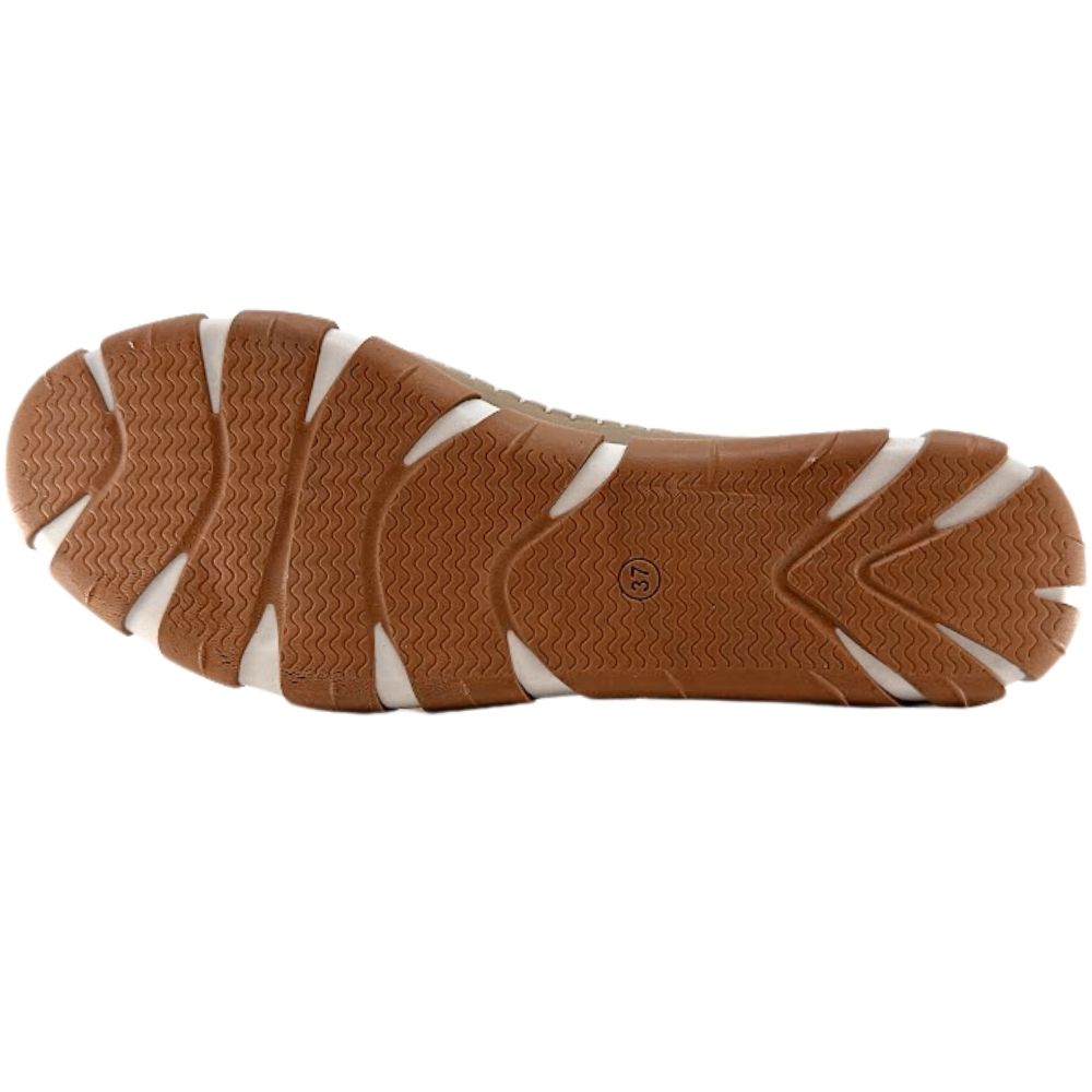 The brown and white rubber outsole of a Cabello sneaker with a tread pattern, shown against a white background.