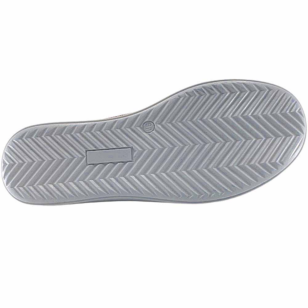 The white rubber outsole of a 'Cabello' sneaker, showing a chevron tread pattern against a white background.
