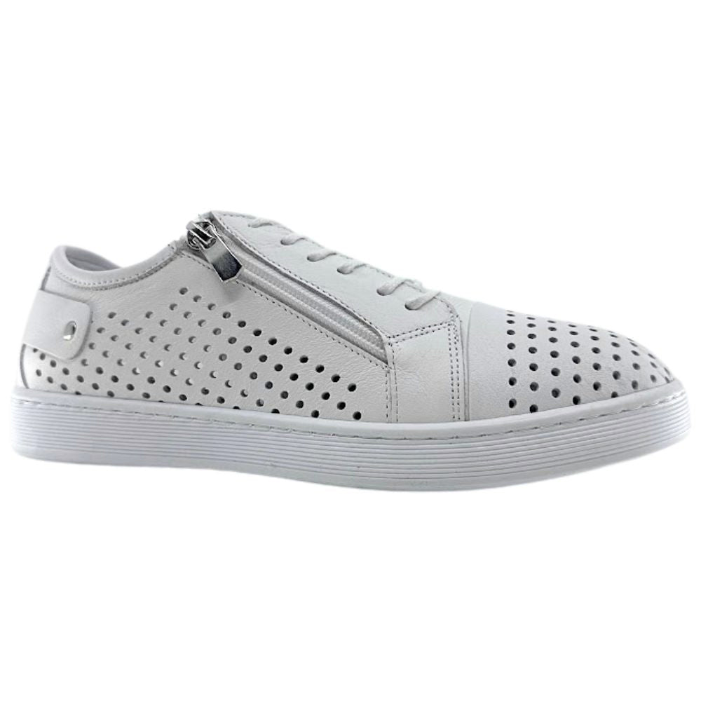 A single white sneaker with a perforated Turkish leather upper, side zip entry and lace-up adjustment, against a white background.
