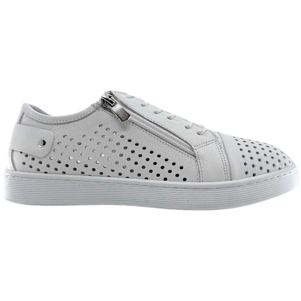 A single white sneaker with a perforated Turkish leather upper, side zip entry and lace-up adjustment, against a white background.