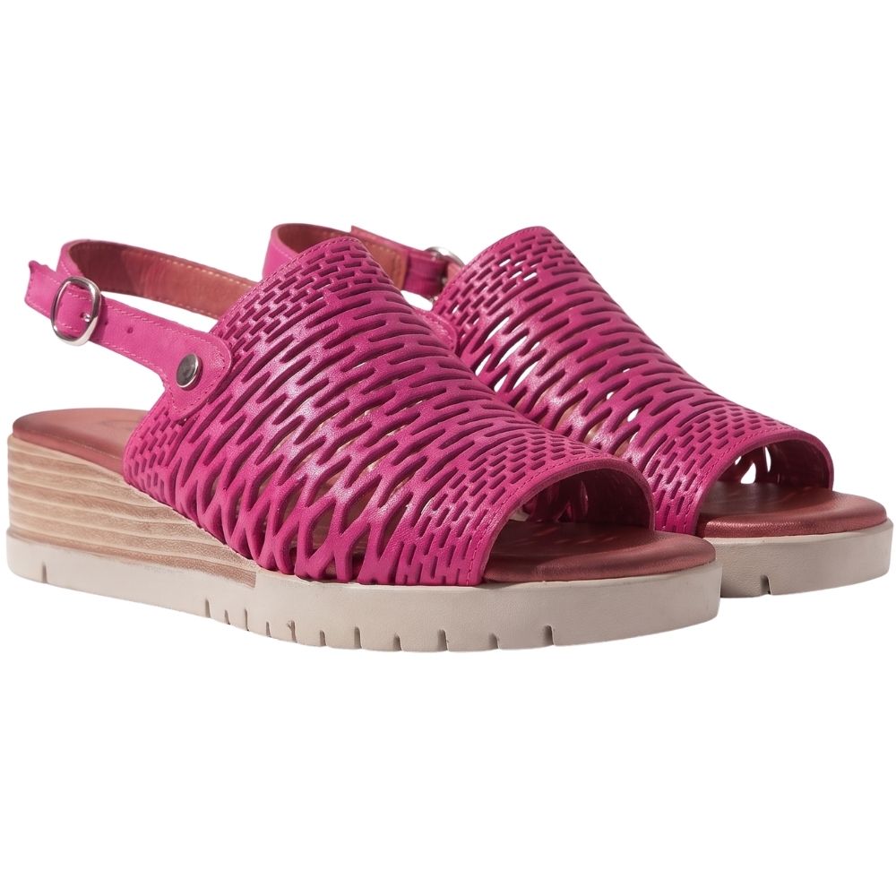 A pair of women's open-toe wedge sandals in a bright pink, featuring a woven upper design, adjustable ankle straps, and light beige platform soles.