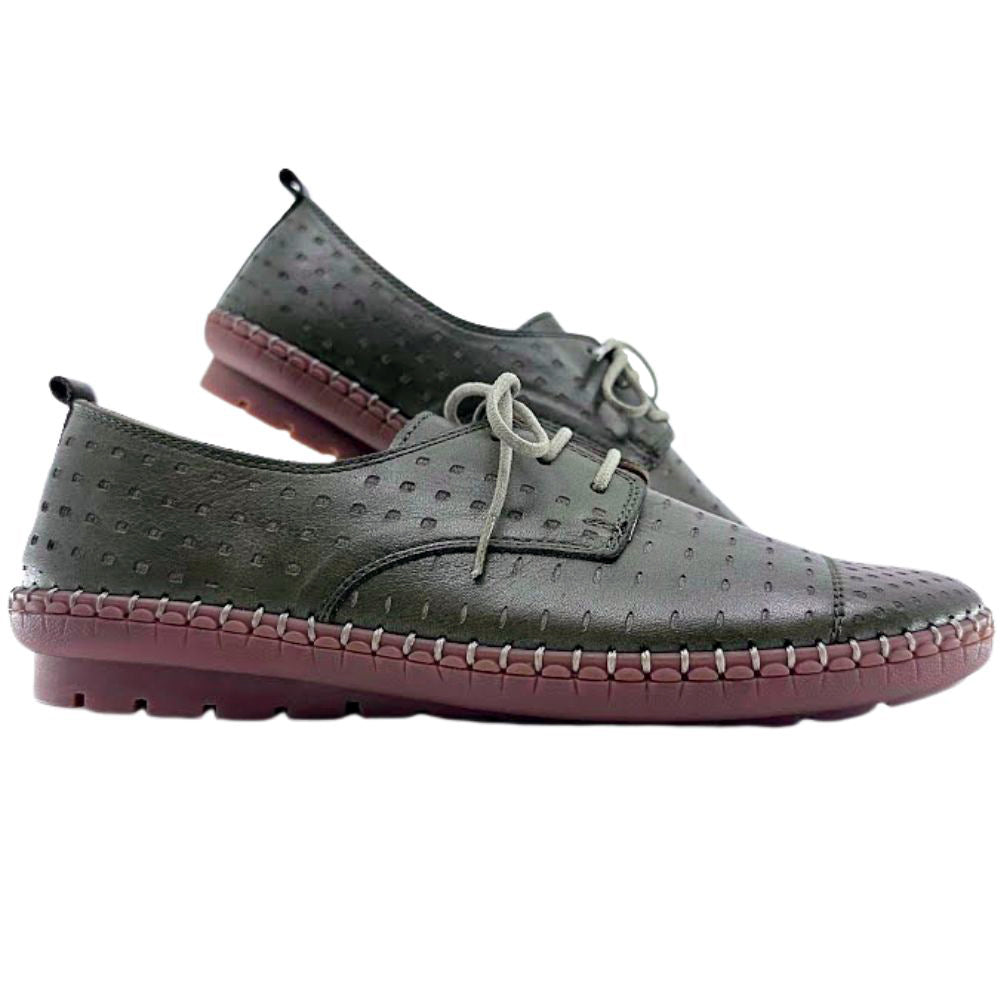 Pair of olive green leather shoes with brown soles on a white background