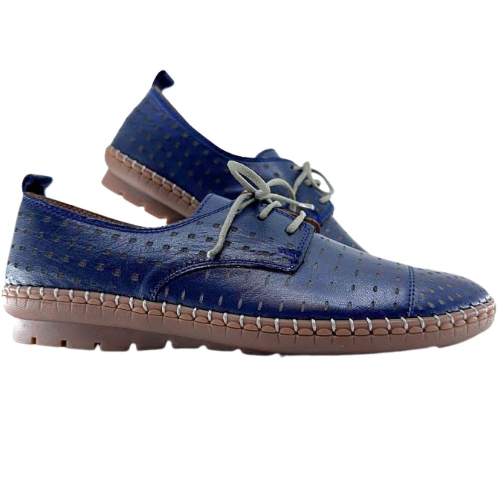 Pair of navy leather shoes with brown soles on a white background