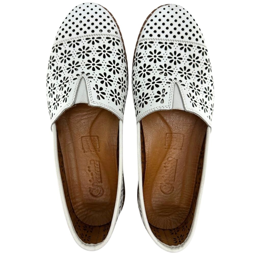 A pair of white laser-cut Cabello leather loafers with a central elastic gusset, shown from a top-down view against a white background.