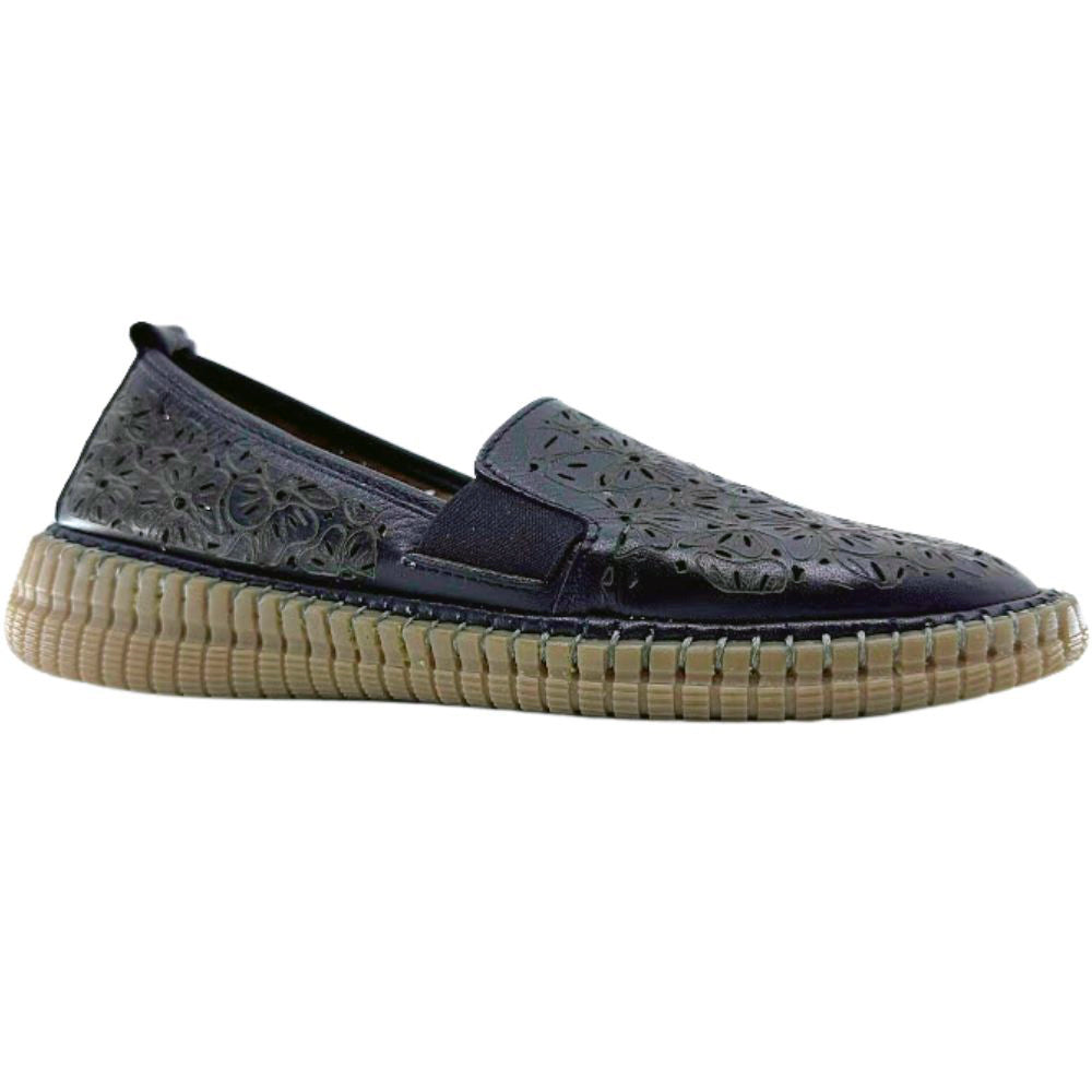 Black slip-on loafer shoe with textured sole on a white background